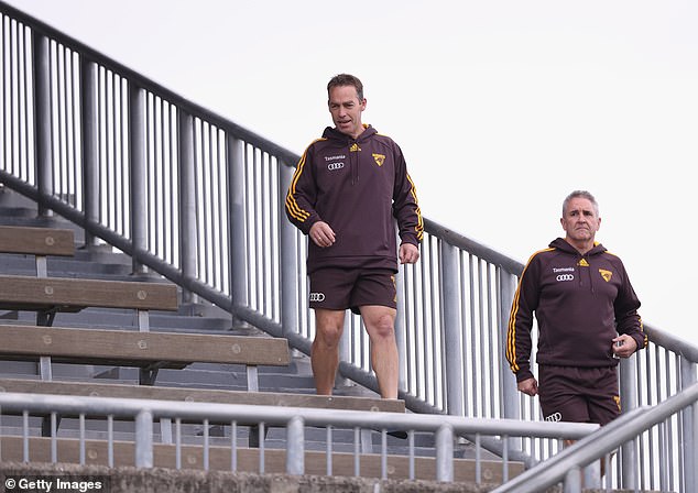 Clarkson (left), who now coaches North Melbourne, Brisbane coach Fagan (right) and Burt deny any wrongdoing and reject accusations of racism.