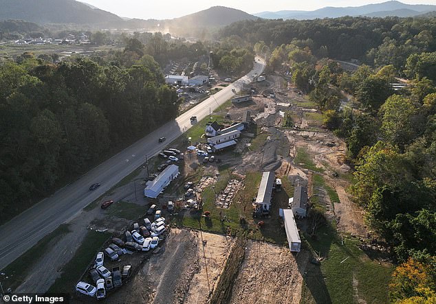 An aerial view of homes damaged by flooding following Hurricane Helene on October 4 in Swannanoa, North Carolina. At least 215 people died in six states