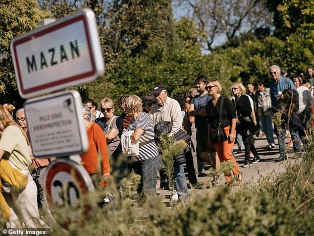 People take part in a march in support of rape victim Gisele Pelicot on October 5, 2024 in Mazan, France.