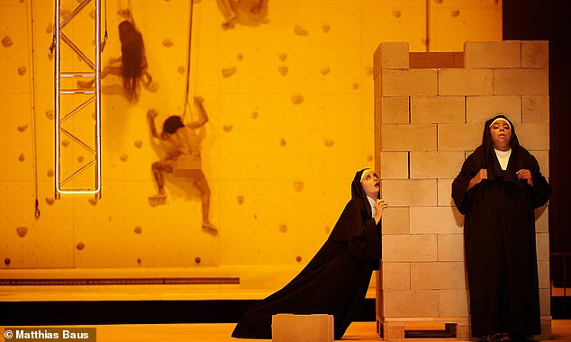 In the opera, a nun warns Susanna with an old story about the nun Beata, who had desired the Savior on the cross and was walled alive for it.