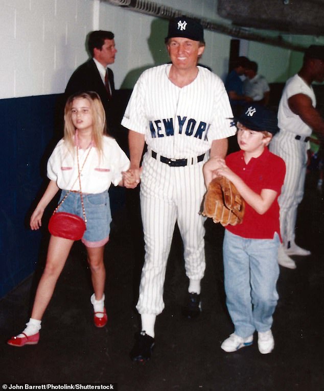 Donald Trump is pictured at the old Yankee Stadium with his daughter Ivanka and son Eric.