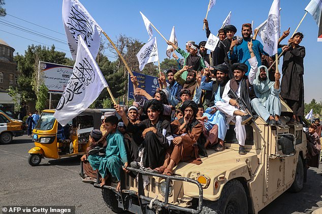 A convoy of Taliban security personnel seen moving through the streets as they celebrate the third anniversary of the Taliban takeover of Afghanistan, in Herat on August 14, 2024.