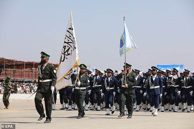 Taliban security personnel take part in a military parade to mark the third anniversary of the takeover of the Taliban government, in Bagram, Afghanistan, August 14, 2024. The Taliban took control of Kabul on August 15, 2021, following the collapse of the US-backed government amid the chaotic withdrawal of foreign troops