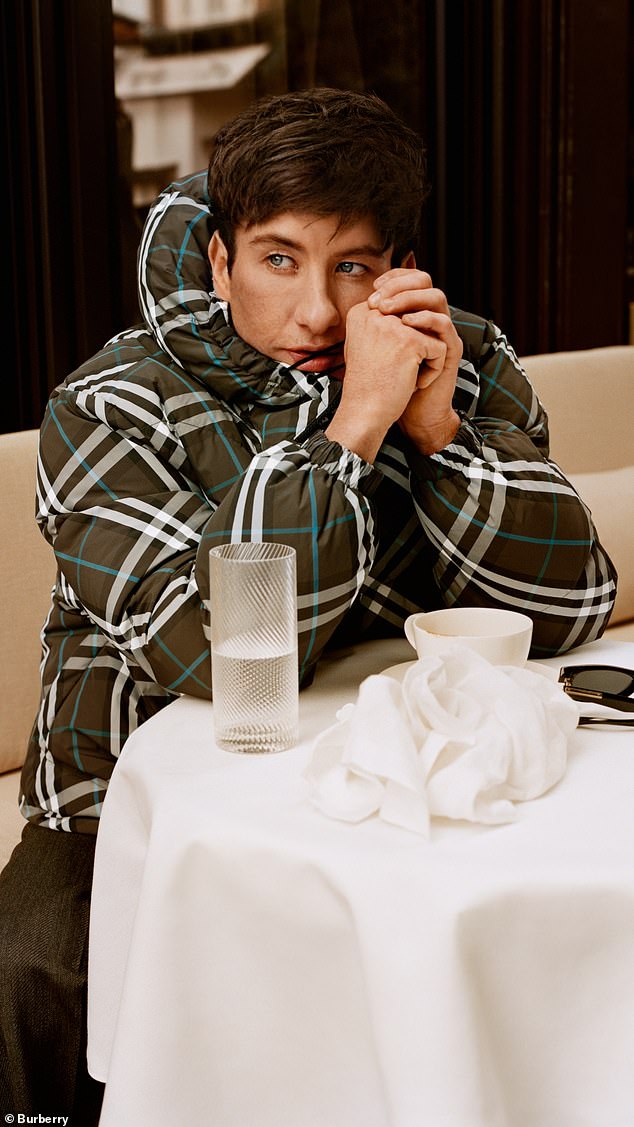 Barry Keoghan kept warm in a khaki and white checkered coat while taking part in Burberry's new outerwear campaign.