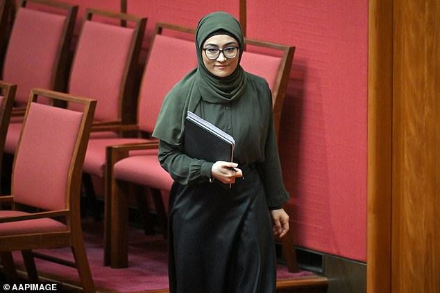 Dual nationals are not normally allowed to run for parliament in Australia. Senator Payman appears in the Senate photo in August.