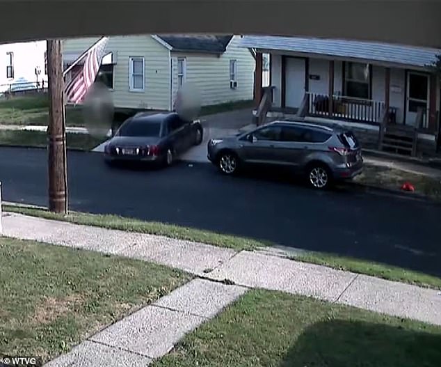 The car is shown driving down the driveway and sliding a pole across the street.