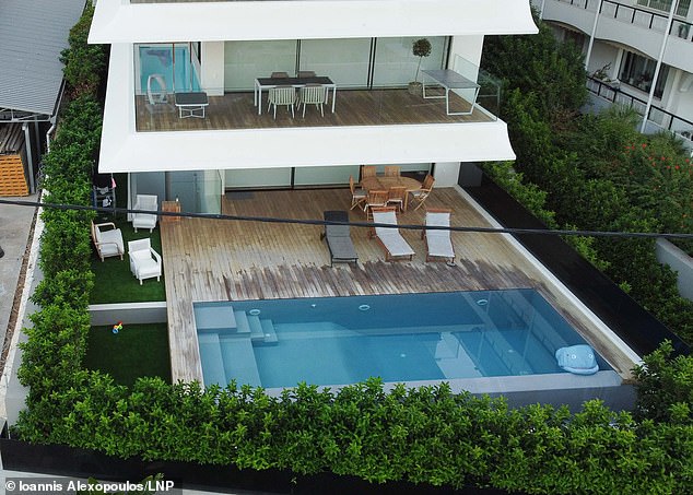 The scene where former Sheffield United defender George Baldock was found dead in his swimming pool in Athens, Greece.