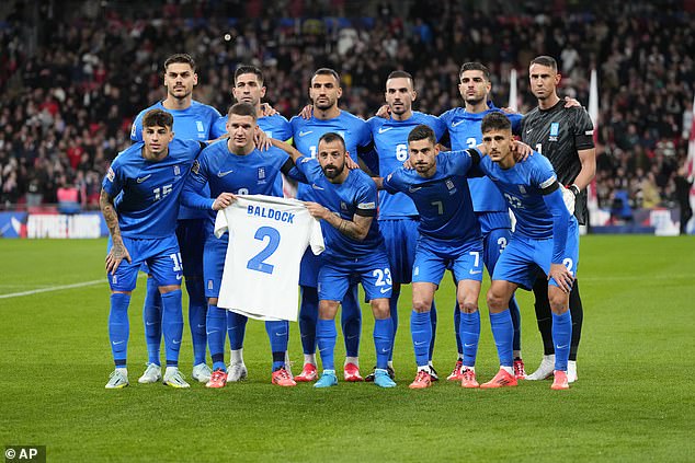 The Greece stars had taken a photo wearing a Baldock jersey before kick-off as they paid tribute.