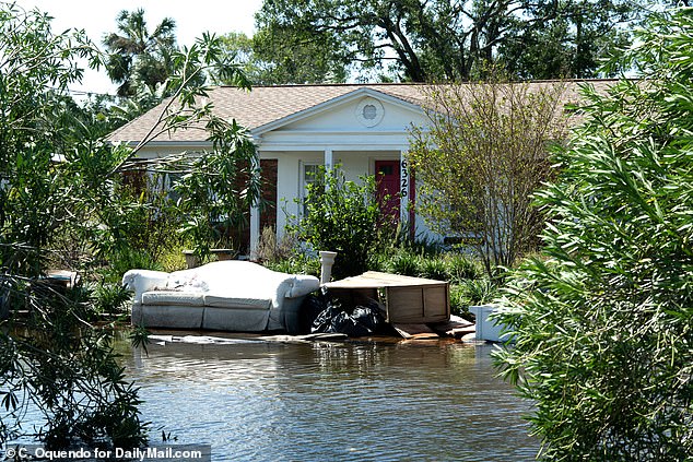 Many Tampa residents were still dealing with the impact of Hurricane Helene, which turned everyday objects into rubble.