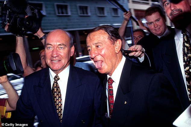 Former NSWRL chief executive John Quayle (left) is pictured arriving at court with ARL president Ken Arthurson during the Super League war.