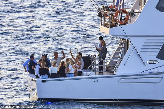 Large crowds gathered at Mrs Macquaries Point to hear the dance music group perform at the Royal Botanic Gardens, while Jackie and her crew partied hard on their exclusive boat.