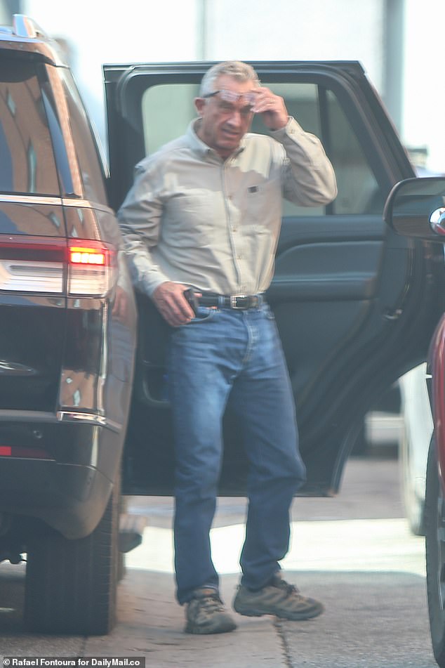 DailyMail.com spotted RFK Jr. California on Thursday getting out of a car, wearing a button-down shirt, blue jeans and glasses.