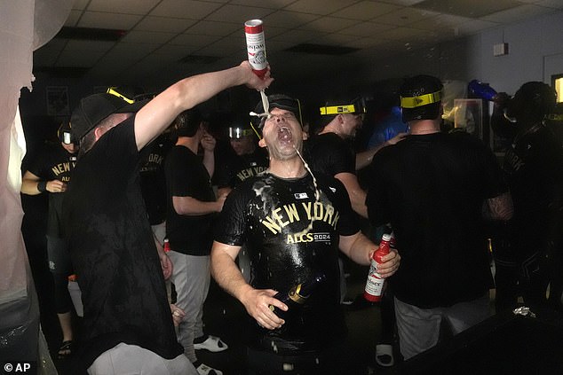 The Yankees enjoyed a drunken locker room celebration after beating the Royals in four games.