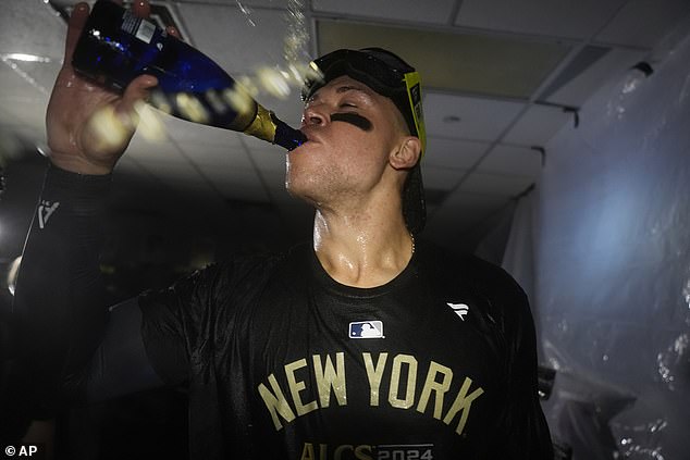 Aaron Judge took a big gulp of champagne after the Yankees wrapped up the ALDS