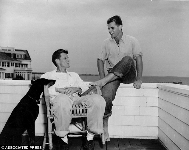 John F. Kennedy with his brother, Robert Kennedy, and their dog, Mo, in Hyannis Port, Massachusetts, in 1946. They were so close that RFK broke down when his brother was assassinated.