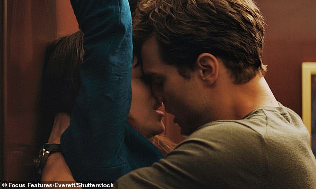 Jamie is pictured with Dakota Johnson in Fifty Shades of Grey.