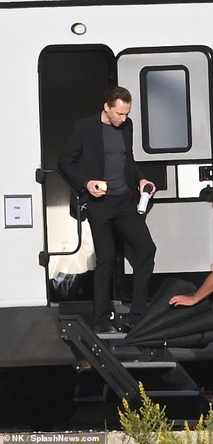 He wore an all-black ensemble as he returned to his role as Jonathan Pine.