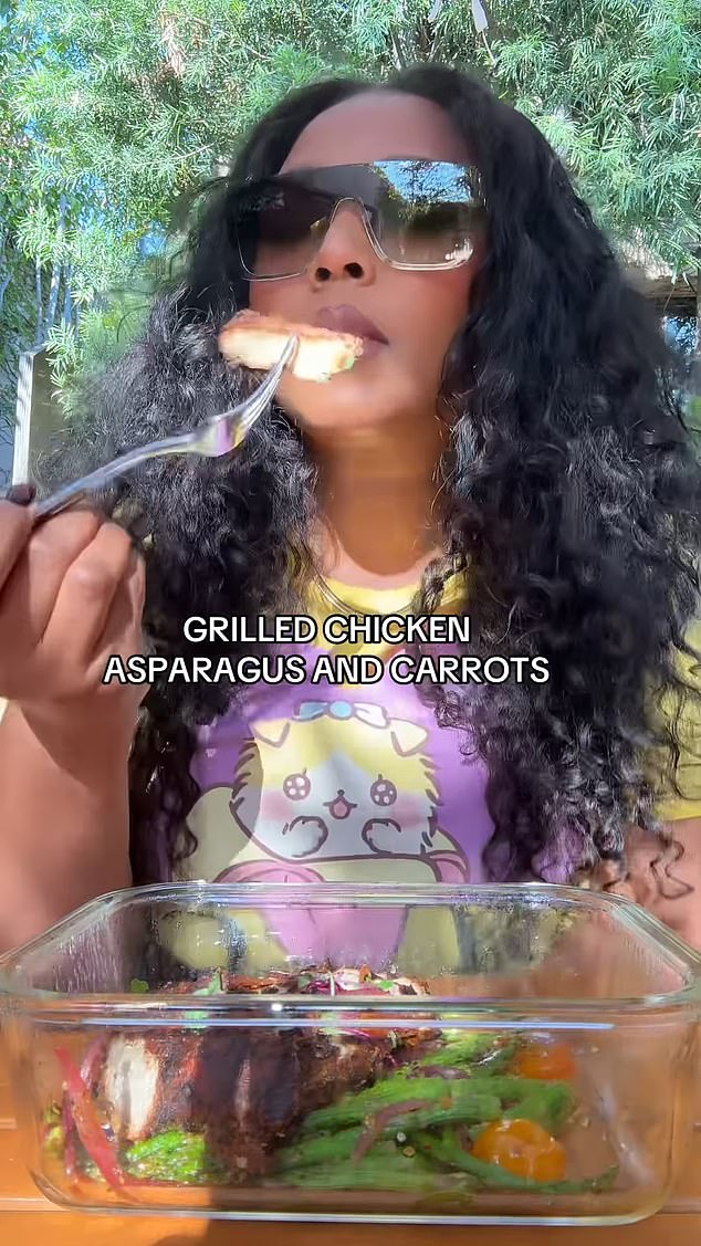 Lizzo, seen here dining on roast chicken, carrots and asparagus, said she wouldn't judge anyone else for their diet, whether raw vegan or carnivorous.