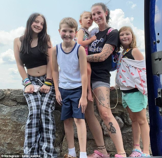 Looking to the future Mrs Spinks, pictured with her four children, says her main goal is to focus on the present 