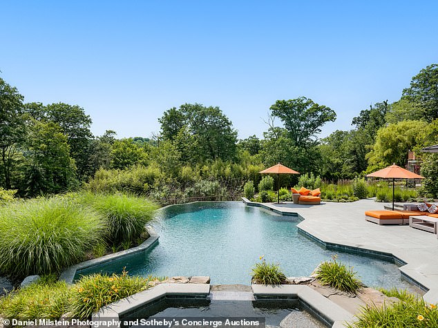 The estate appears to be its own resort with this attractive infinity pool.