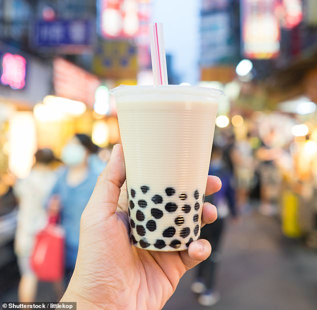 Bubble tea is a beverage that contains tapioca balls called boba; it originated in Taiwan in the early 1980s, and has soared in popularity recently (stock image)