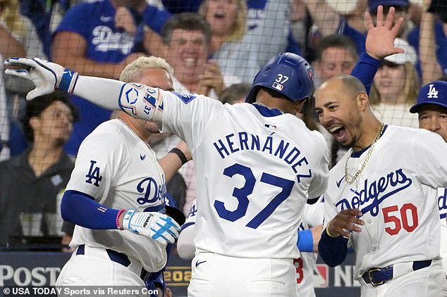 Los Angeles Dodgers outfielder Teoscar Hernández (37) celebrates a home run