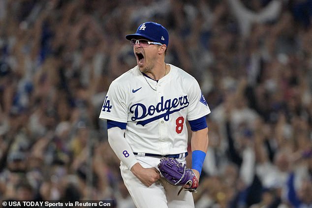 Los Angeles Dodgers third baseman Kiké Hernández (8) celebrates Friday's victory.