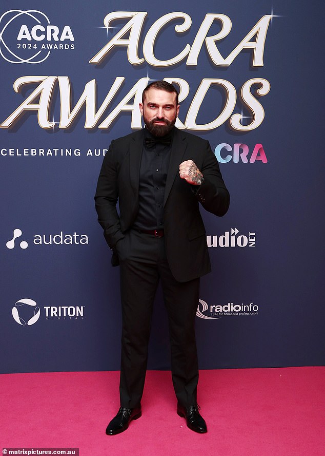 British SAS Australia star Ant Middleton looked dapper in a black suit with a shirt, matching underwear and patent leather dress shoes.