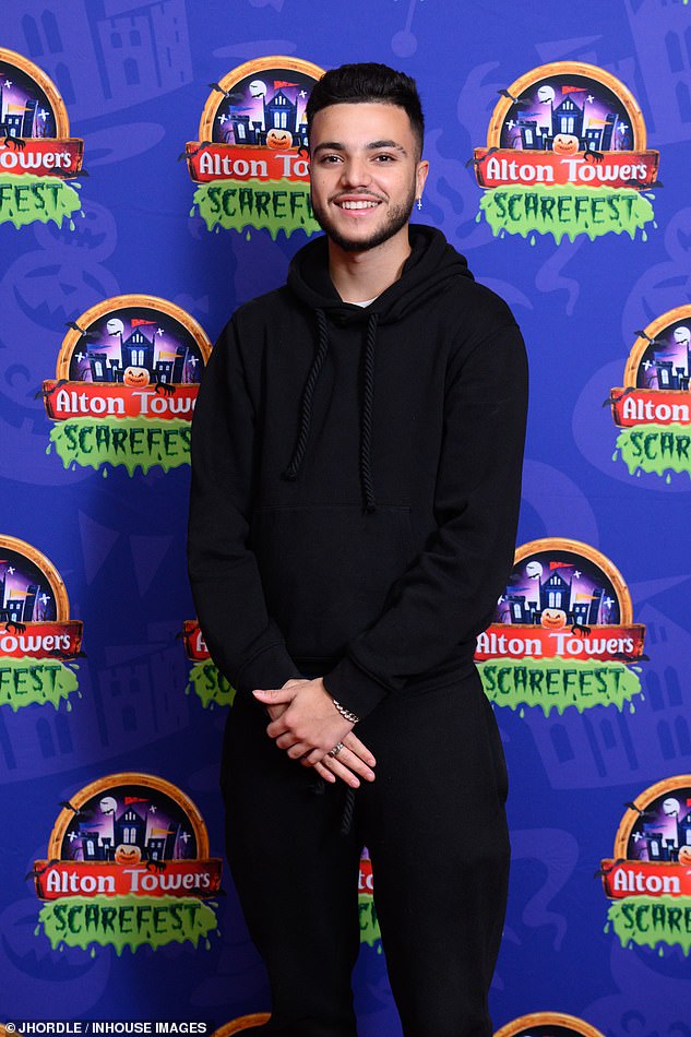 Junior rocked a black hoodie and drawstring sweatpants as he posed up a storm on the red carpet.