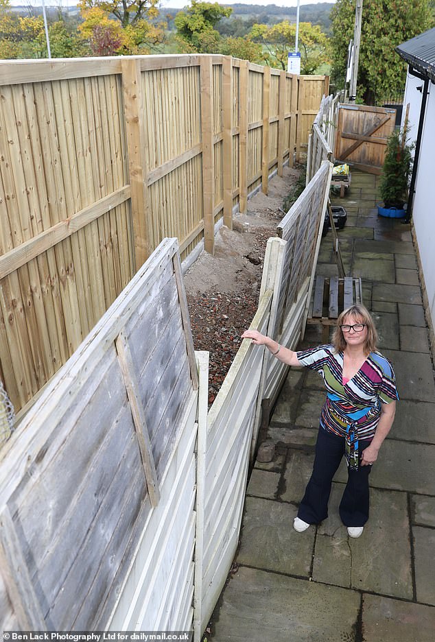 Rachel (pictured) and her husband Peter, 70, believe a 15ft trench for a water treatment tank less than six feet short of its boundary caused their concrete retaining wall to slip and crack .