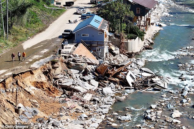 Destroyed and damaged buildings following flooding from Hurricane Helene on October 8, 2024 in Bat Cave, North Carolina