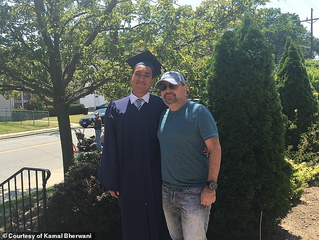 Ethan and Kamal photographed together at the young man's high school graduation