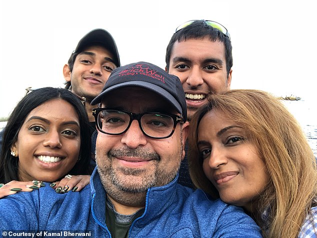 Ethan photographed with his family: his father, his stepsister Natalia, his brother, his stepmother, Sabita at the Monterey Bay Aquarium.