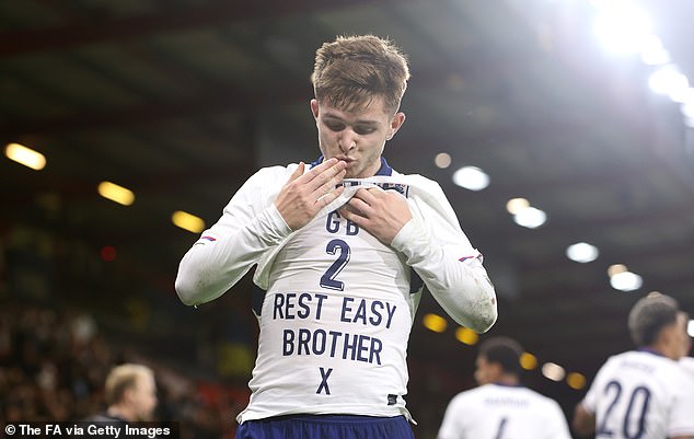 McAtee was pictured celebrating his second goal as he presented a tribute to the late George Baldock.