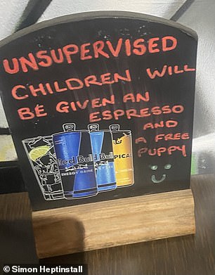 A sign inside the pub warns parents what will happen if their children go unsupervised