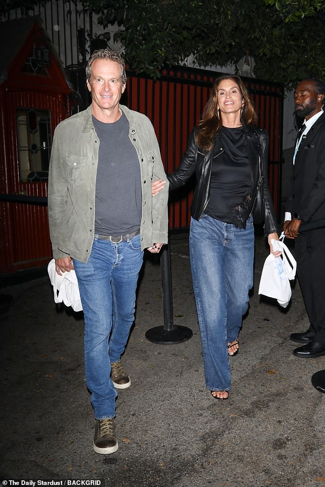 Meanwhile, her husband Rande, 62, cut a more relaxed figure while wearing a gray T-shirt and a khaki denim overshirt.