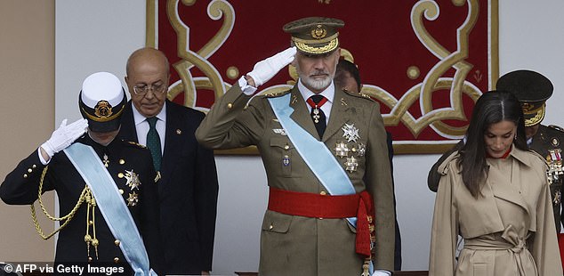 Princess Leonor (pictured, left), King Felipe (pictured, center) and Queen Letizia (pictured, right) appear at Saturday's event.