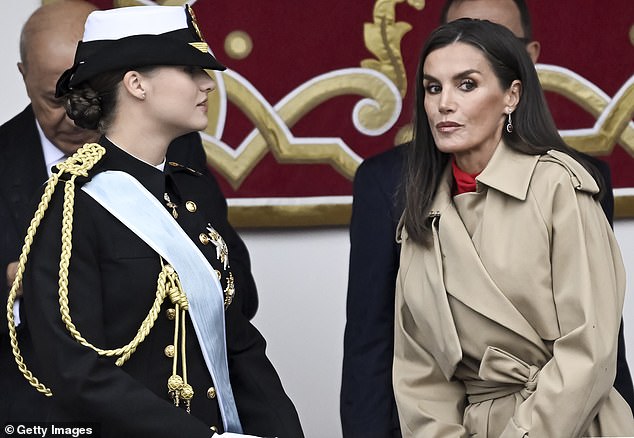 MOTHER AND DAUGHTER MOMENT: At one point, Queen Letizia (pictured, right) was photographed talking to her eldest daughter, Princess Leonor (pictured, left).