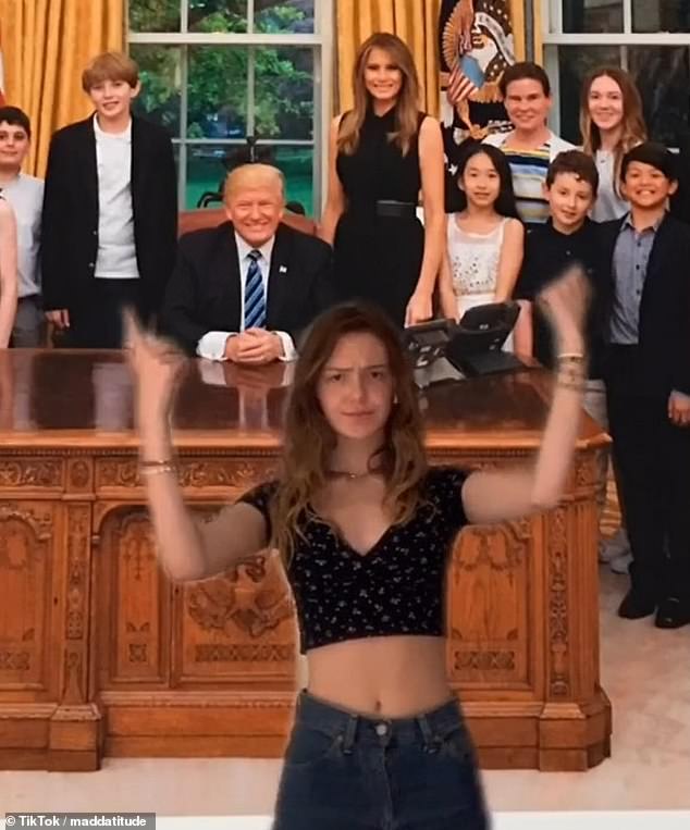 To back up her claim of visiting the White House with Trump, she presented a photo of herself and her classmates alongside Republican candidate Donald Trump and Melania at the White House.