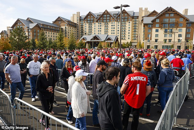 People line up to hear Republican presidential candidate and former US President Donald Trump speak.