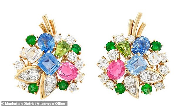 The Manhattan District Attorney's Office charged Gray with stealing seven items, including a pair of gold, sapphire, emerald and diamond earrings (pictured).