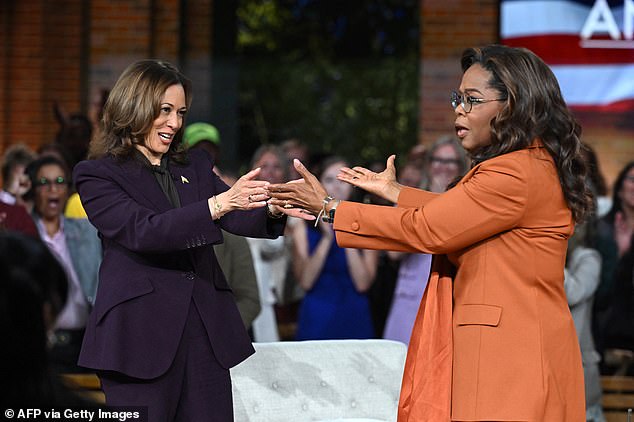 Kamala Harris with Oprah Winfrey at a live-streamed 'Unite for America' rally in Farmington Hills, Michigan