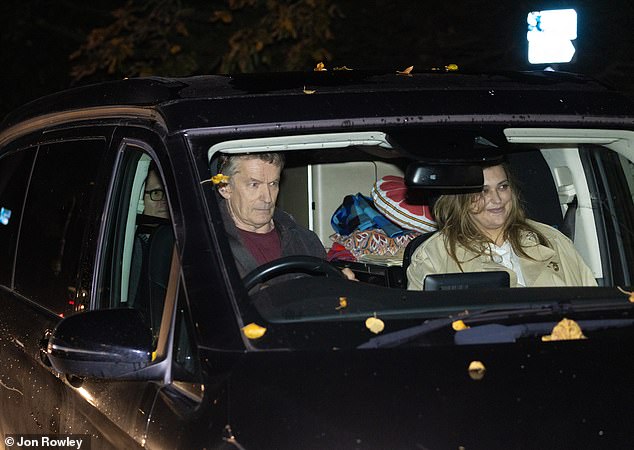 The 60-year-old was pictured picking up Ms Hart from the Cheltenham Literature Festival last night.