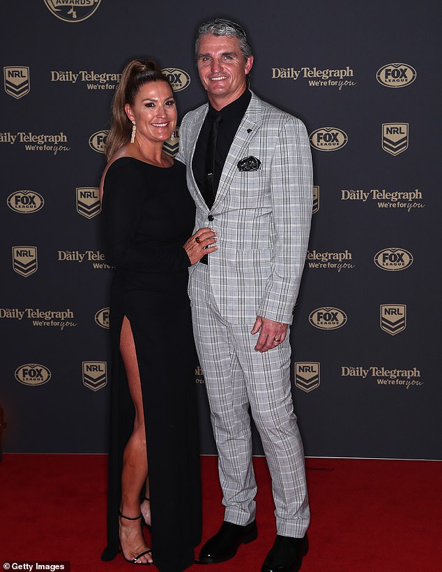 Cleary (pictured with wife Rebecca) is a four-time premiership-winning trainer.