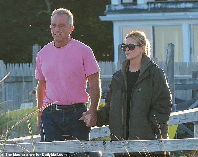 The grieving couple is seen at the Kennedy Complex in Hyannis Port Massachusetts taking a walk along the pier.