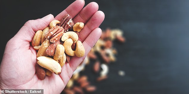 Eating just 30 grams of unsalted and unprocessed nuts reduces the risk of developing the disease by 12 percent (file photo)