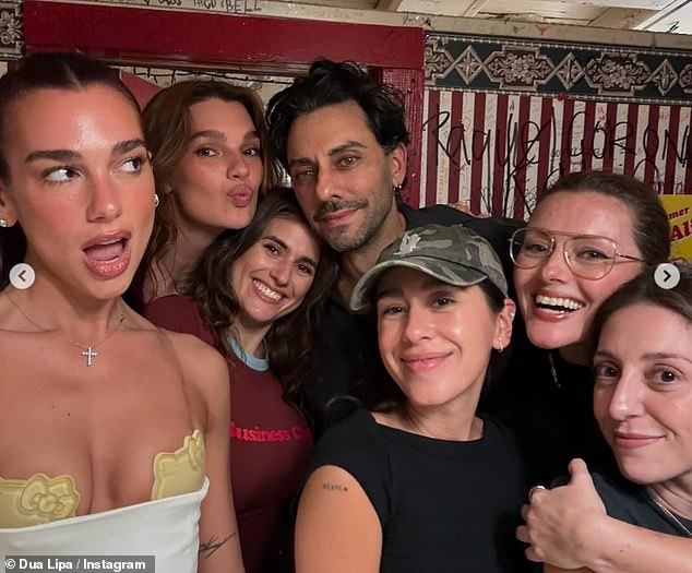 Dua posed for a fun selfie with her friends as she continued to show off her Hello Kitty bra.