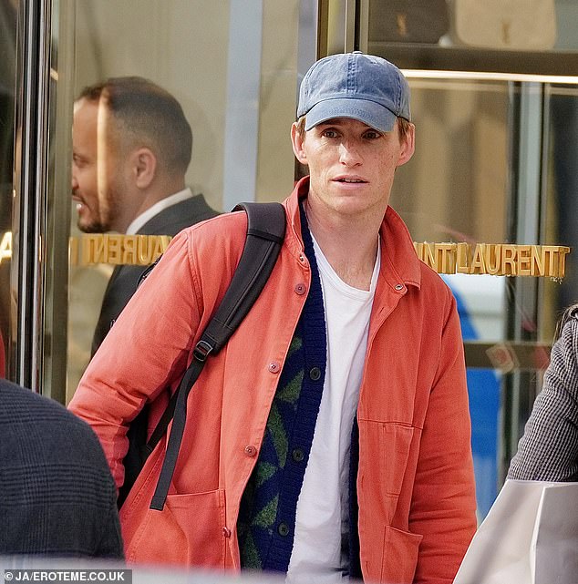 Eddie Redmayne had to wait like any other customer at Saint Laurent, which only allows one customer into its London flagship at a time.