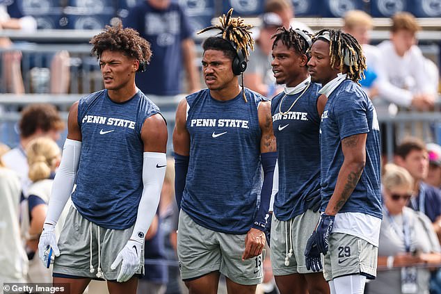 Audavion Collins (right) was scolded by Franklin after the game for planting a flag.