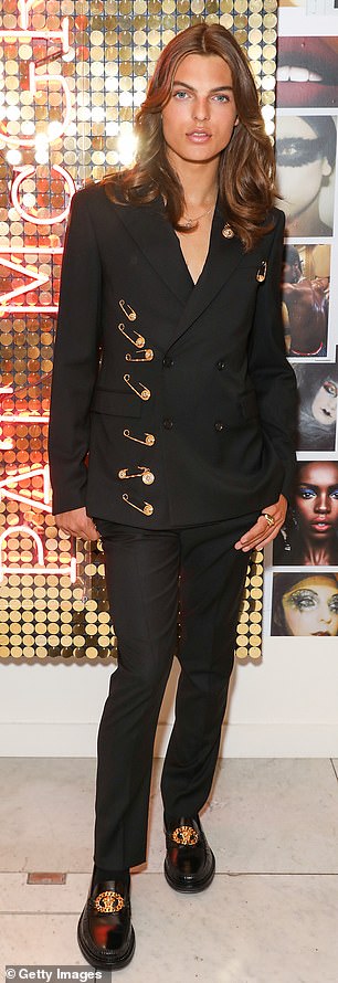 While Damian has yet to don the iconic safety-pin dress that made Elizabeth a household name, he paid homage to the outfit while attending a makeup launch event in 2019.